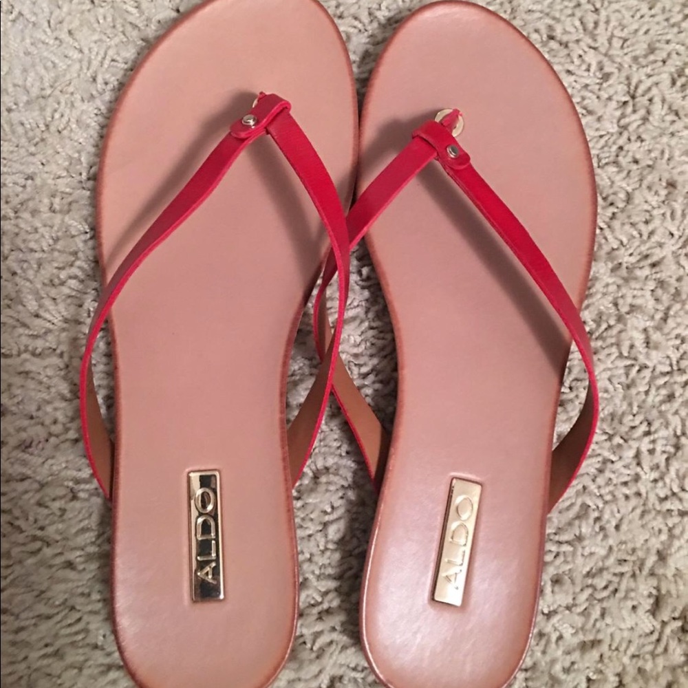 Red leather flip flops